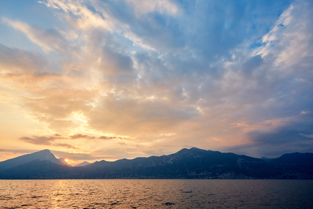 beautiful view of Garda lake at sunset. Italy, Lago di Garda.の写真素材