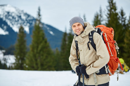 hiker  on the trail in the Carpathians mountains at winterの写真素材