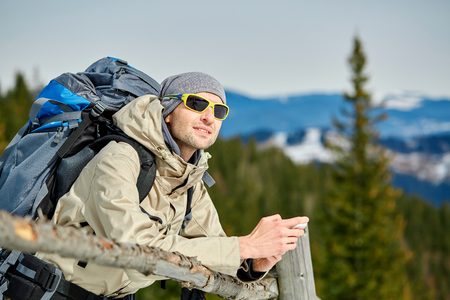 hiker  on the trail in the Carpathians mountains at winterの写真素材
