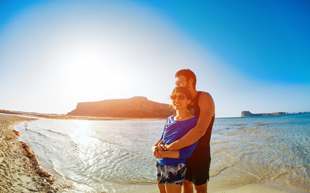young happy couple running on the beach. Balos beach, Crete, Greece.の写真素材