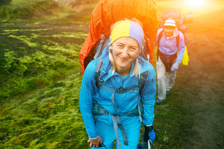 hikers on the trail in the Islandic mountains. Trek in National Park Landmannalaugar, Icelandの写真素材