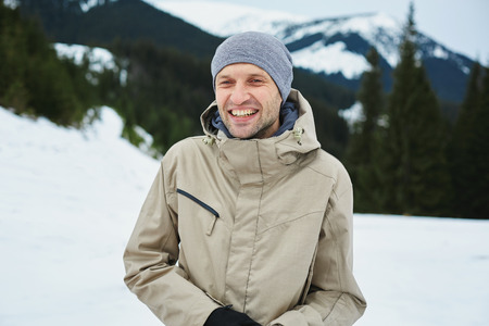 hiker on the pass in the Carpathians mountains at winterの写真素材