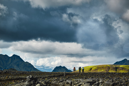 Travel to Iceland. Beautiful Icelandic landscape with mountains, sky and clouds. Trekking in national park Landmannalaugarの写真素材