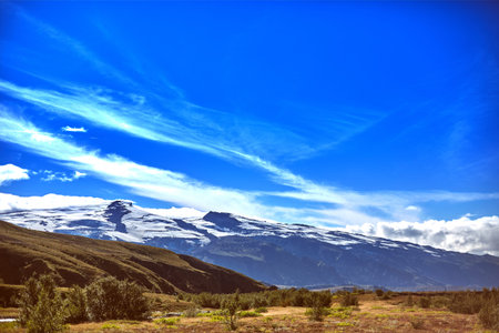 Travel to Iceland. Beautiful Icelandic landscape with mountains, sky and clouds. Trekking in national park Landmannalaugarの写真素材