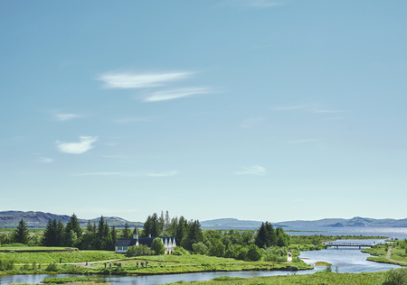 walking in Thingvellir National Park, Iceland. Thingvellir National Park - famous area in Iceland right on the spot where the atlantic tectonic plates meets.の写真素材
