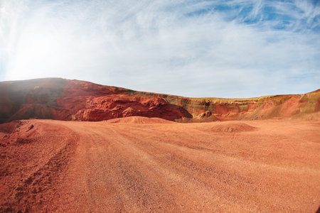 Cerid volcano crater in Iceland. Stone rock red and black.