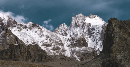 beautiful misty mountain view. Mountain range and Severe mountain peaks with rock walls and ice...