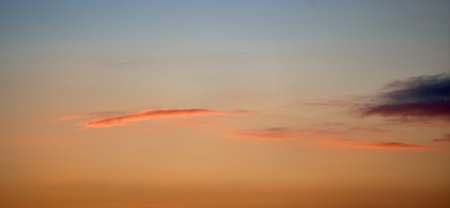 Fiery orange sunset sky. Sky texture, abstract nature backgroundの写真素材