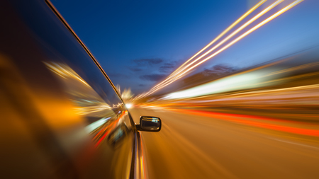 blurred urban look of the car movement nights long exposureの写真素材