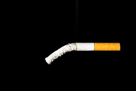 The cigarette end is breaking down. Impotence concept.の写真素材