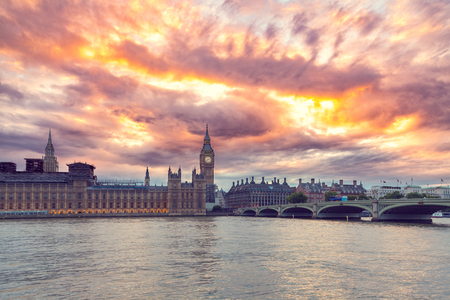 Big Ben and the Palace of Westminster, dramatic sunset sky, landmark of London, UKの写真素材