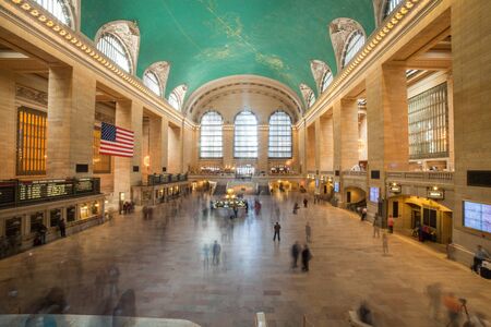 NEW YORK, NY, April 22, 2015: commuters and tourists in the grand central station in April 22, 2015 in New York. It is the largest train station in the world by number of platforms: 44, with 67 tracksのeditorial素材