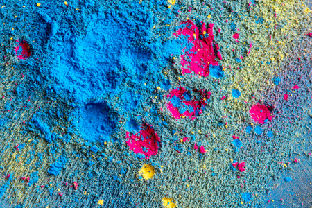 Drops of CMYK toner on cyan backgroundの写真素材