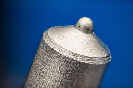 Common Rail Fuel injector nozzle super macro on blue backgroundの写真素材