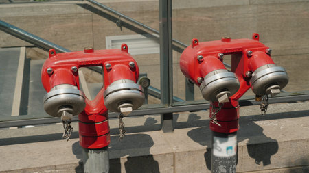 Red fire hydrant near the underground passage in Berlin