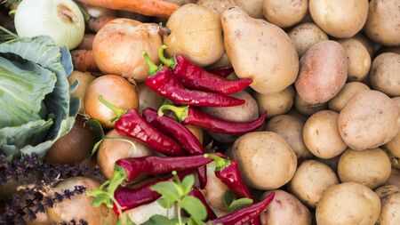 Set of seasonal vegetables - peppers and potatoes, healthy and tasty cabbage and carrotsの写真素材