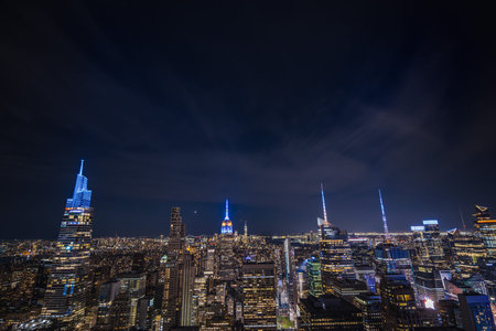 Night view of Midtown Manhattan with illuminated skyscrapers