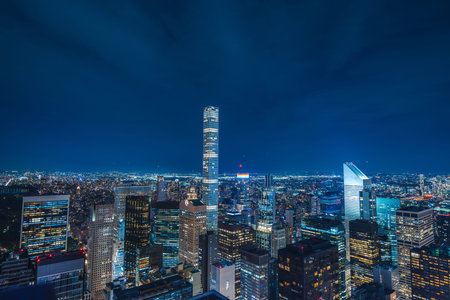 New York skyline at night with modern skyscrapers and illuminated city lights