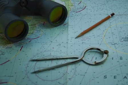 Essential tools for navigation at sea  parallel ruler, plotter compas divider binokulars, chart の写真素材