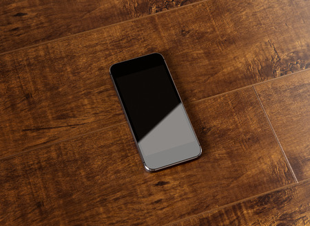 Photo. Smart phone on premium wood backgroundの写真素材
