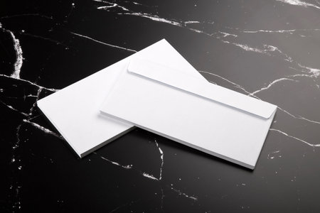 Photo of branding identity mock up on marble. Template isolated on marble background. For graphic...