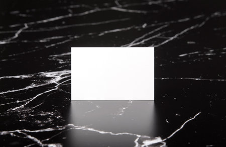 Photo of white business cards on marble. Template for branding identity isolated on marble...