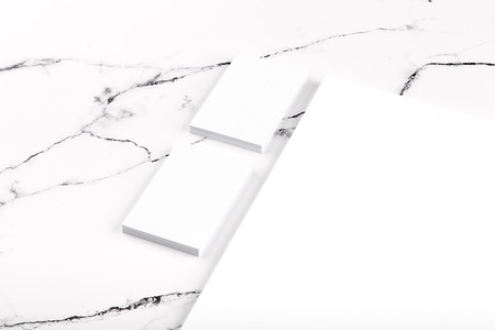 Photo of branding identity mock up on white marble. Template isolated on marble background. For graphic designers presentations and portfolios marble premium luxury mock-upの写真素材