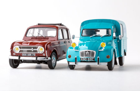 Photo of the assembled Renault 4 and CitroÃ«n 2CV 1:24 scale model car isolated on white...