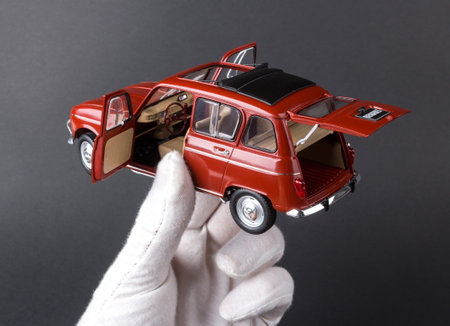 Photo of the assembled Renault 4 1:24 scale model car isolated on gray background, Kazakhstan, Almaty, June, 09, 2018のeditorial素材