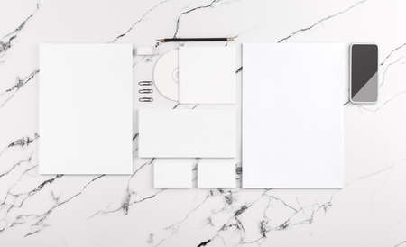 Photo of branding identity mock up on white marble. Template isolated on marble background. For graphic designers presentations and portfolios marble premium luxury mock-upの写真素材