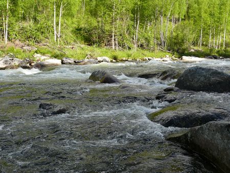 The mountain river in the Western Sayan mountainsの写真素材