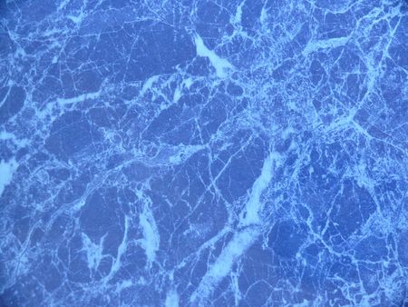 Structure under a dark blue marbleの写真素材
