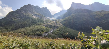 Summer mountains valley canyon wide summer panorama North Caucasus landscape, Dombai, Russia.