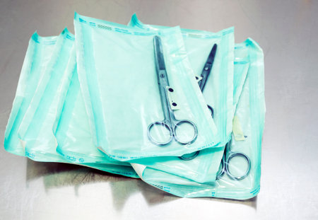 medical scissors on a table with shallow depth of field