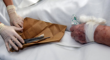 surgical instruments, doctor, hands, elderly woman, hands.