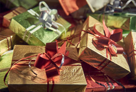 gifts on the background of a wooden table. background, packaging. a bunch of gifts.の写真素材