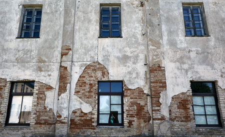 Old brick wall background - exterior broken wall.