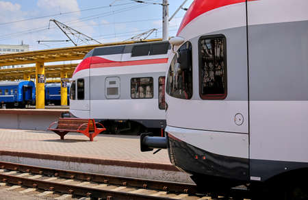 a high-speed train is sitting at the station, waiting for passengers.の写真素材