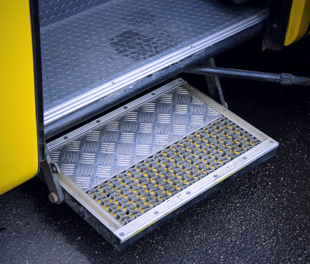 Ramp for disabled people and infants on the bus. Additional retractable step in public transport.の写真素材