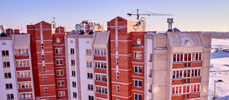 Modern Residential Apartment Building with Stylish Facade and Spacious Living Spacesの写真素材