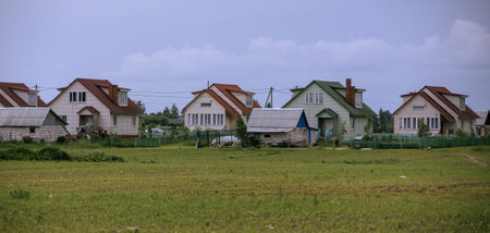 Charming countryside homes surrounded by lush greenery in a serene rural setting