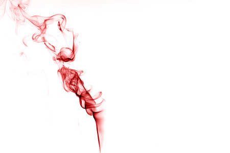 red smoke on a white background,Abstract red smoke swirls over white background, fire smoke,red ink,movement of red smokeの写真素材