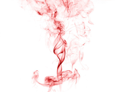 red smoke on a white background,Abstract red smoke swirls over white background, fire smoke,red ink,movement of red smokeの写真素材