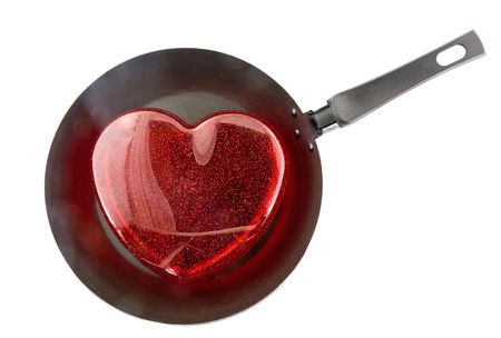 Frying pan with the big red heart. -Fried heart. Isolatedの写真素材