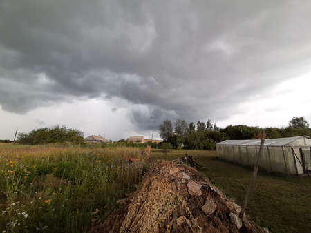 Farmland scenery storm. Wait for hurricane in the countrysideの写真素材
