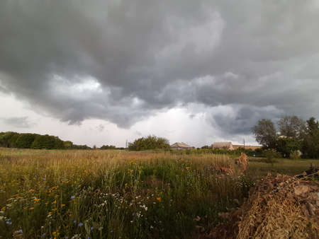 Farmland scenery storm. Wait for hurricane in the countrysideの写真素材