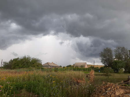 Farmland scenery storm. Wait for hurricane in the countrysideの写真素材