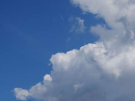 Clear blue sky and white cloudsの写真素材