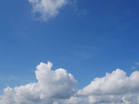Clear blue sky and white cloudsの写真素材