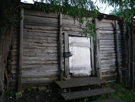 Old rustic wooden barn. 70 years of the 20th century. Summerの写真素材